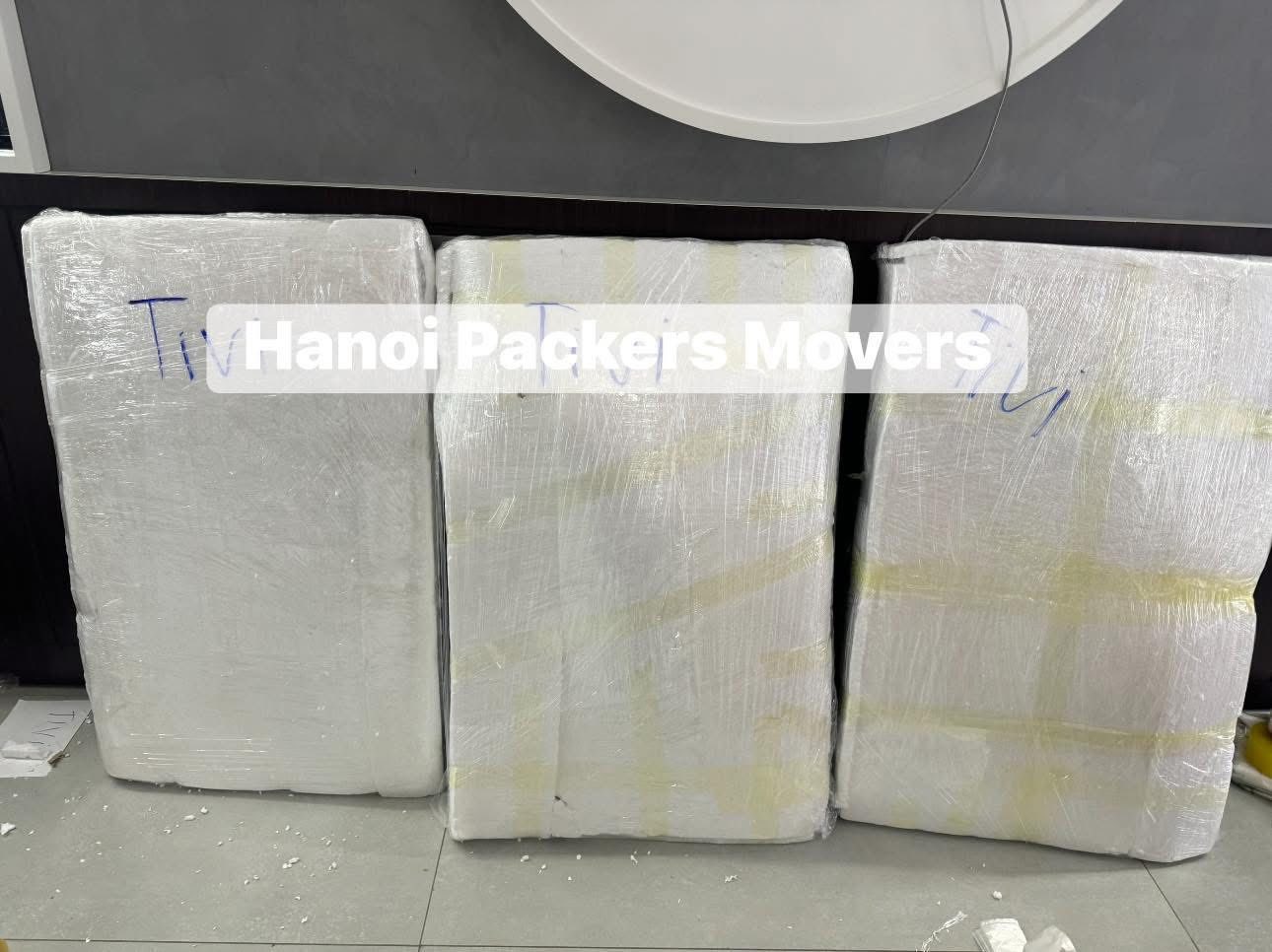 Packing and wrapping TV for moving to Ho Chi Minh City