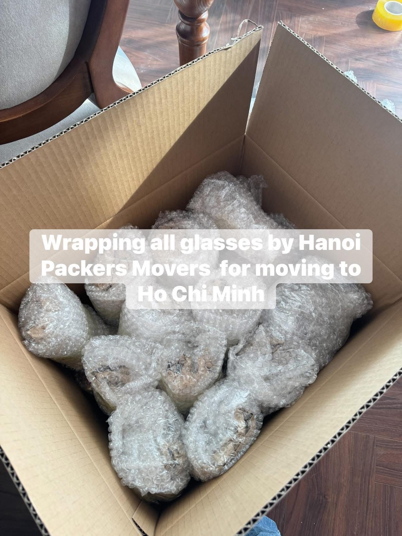 Packing and wrapping fragile items for moving to Hoi An