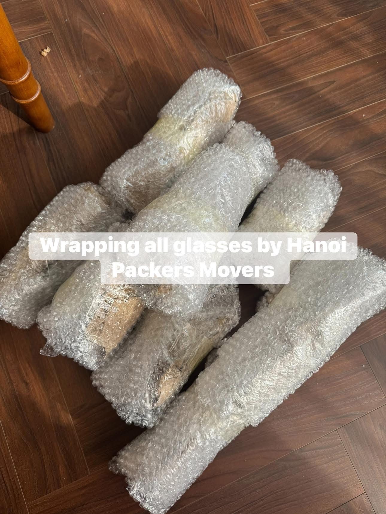 Packing and wrapping fragile items for moving to Danang